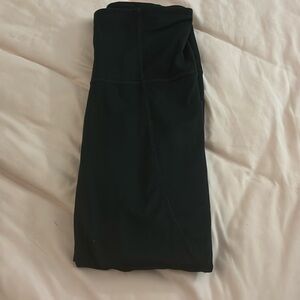 Two pairs of black all in motion leggings, size small and medium